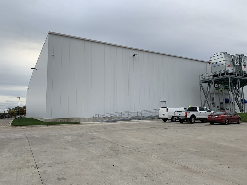 Completed freezer addition from the yard, with the existing plant and process equipment alongside it