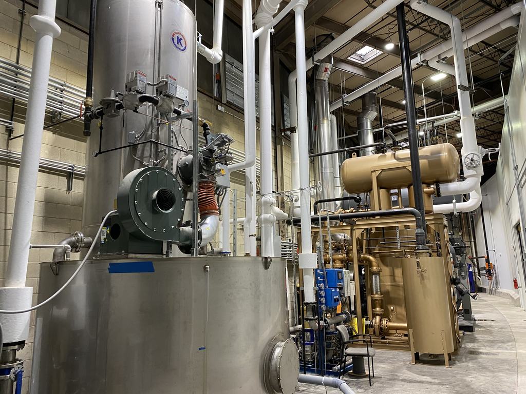 New boiler and thermo-fluid heating equipment installed inside the facility